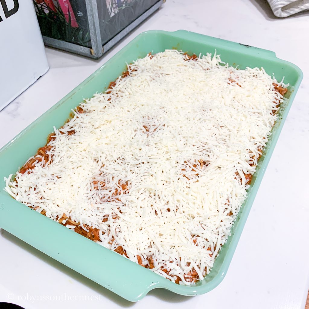 spread shredded mozzarella on top of the spaghetti squash 