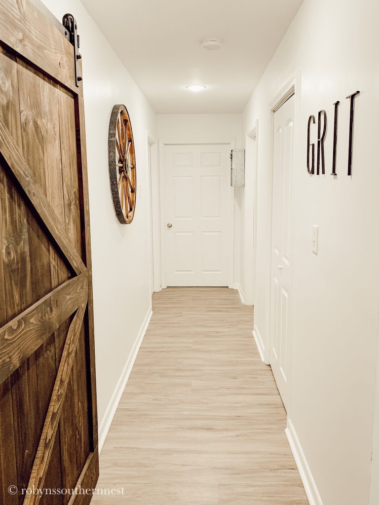 Hallway with laminate flooring - Robyn's Southern Nest 