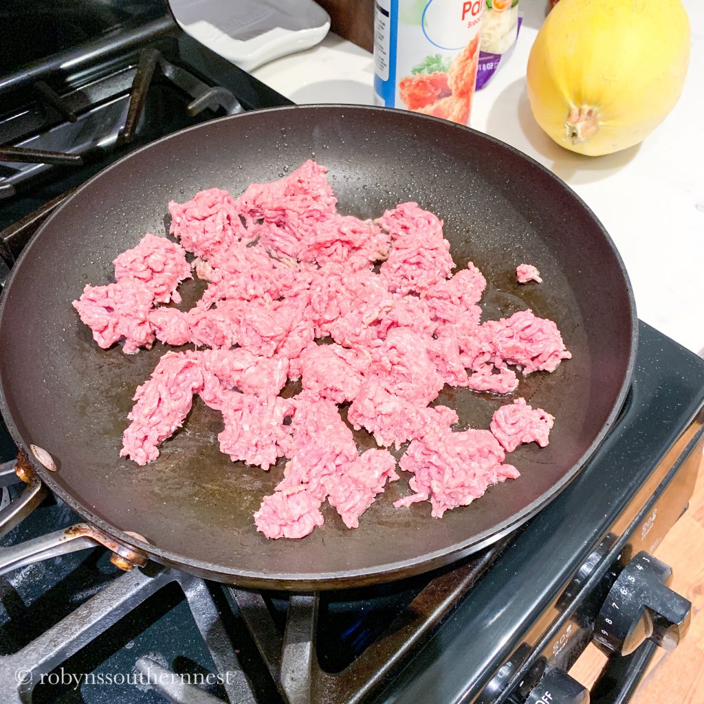 browning ground beef in a pan