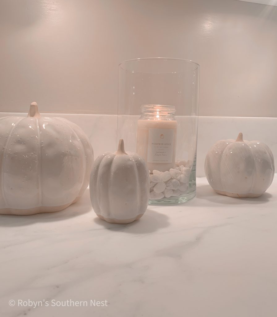 fall styled sink
white ceramic pumpkins 